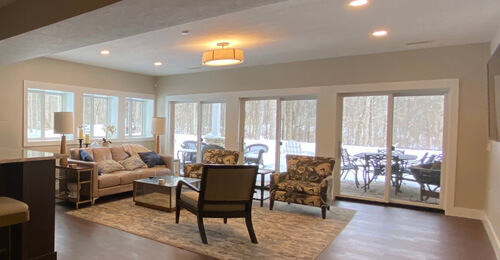 Lower level living room of a courtyard ranch home