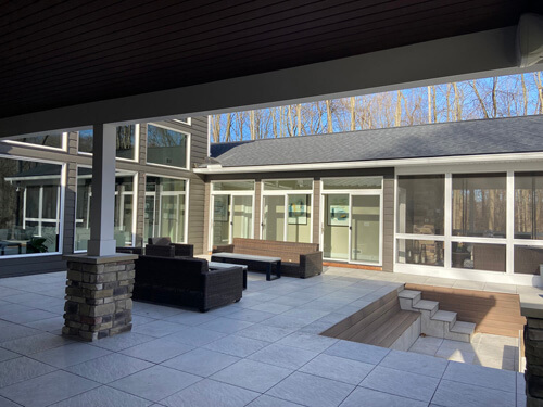 Side view of back patio of a courtyard ranch home