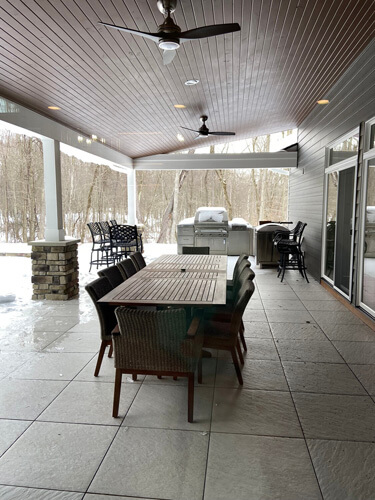 Covered lower level patio of a courtyard ranch home