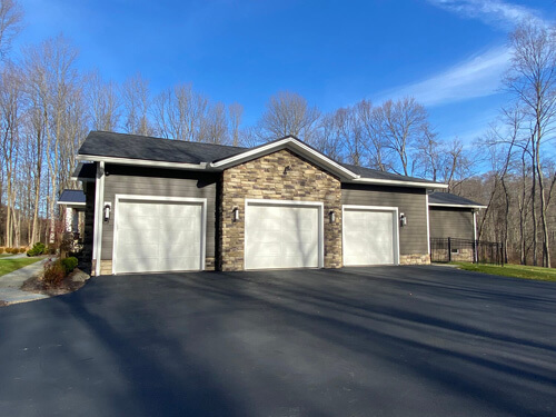 Three-car garage of a courtyard ranch home