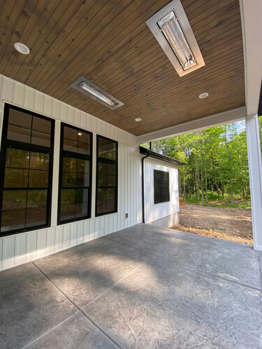 Back porch of a Modern Farmhouse home